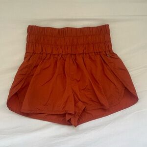 rusty orange free people exercise shorts